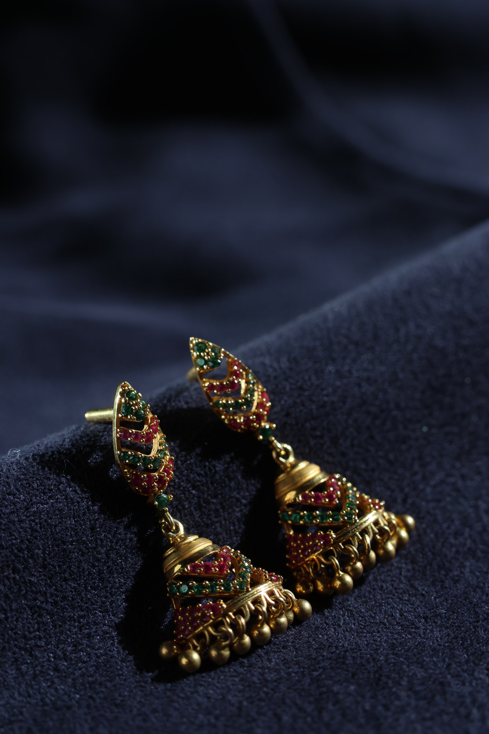 Traditional gold earrings product shot